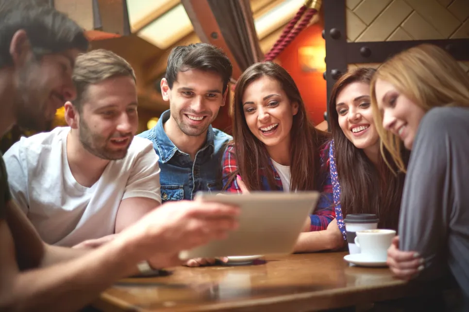 group-of-friends-enjoying-in-a-coffee-shop_329181-12574
